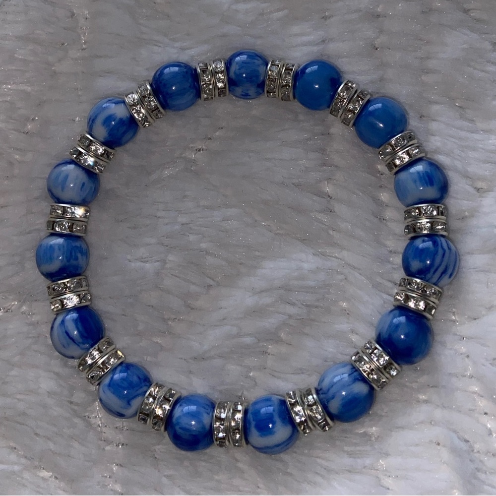 Porcelain themed bracelet with silver spacers